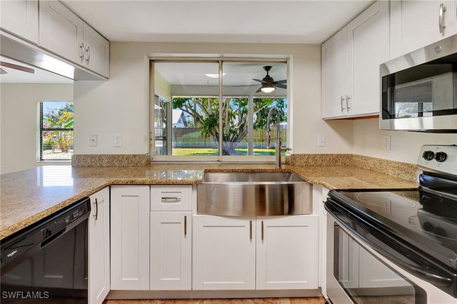 New custom sink with a gorgeous view of you private back yard | Image 4