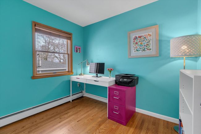 Bedroom 3 featuring hardwood floors and ample sunlight | Image 9