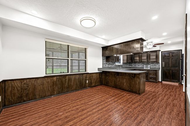 Large formal dining room off the kitchen. | Image 18