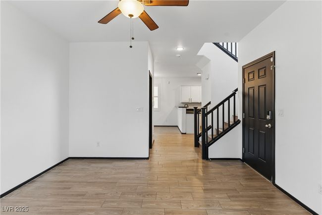 Entrance with recessed lighting, stairway, baseboards, light wood-type flooring, and a ceiling fan | Image 4