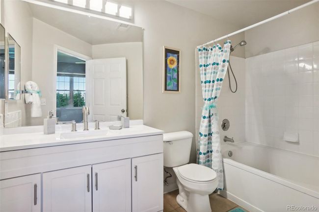 Primary bedroom full bathroom, new vanity with pull out shelving, new faucet and large oval soaking tub. | Image 19