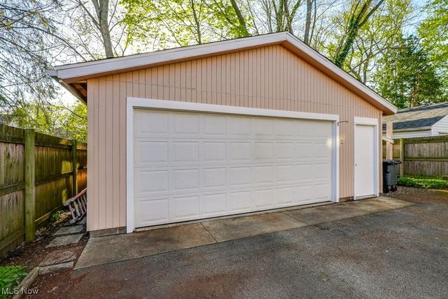 Detached two car+ garage with fence | Image 4