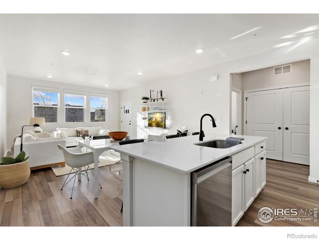 Open floor plan with kitchen open to dining area and living room | Image 7