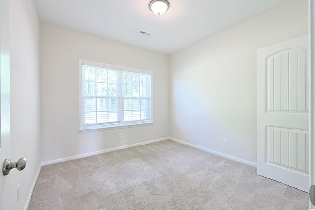 Carpeted spare room featuring baseboards | Image 22