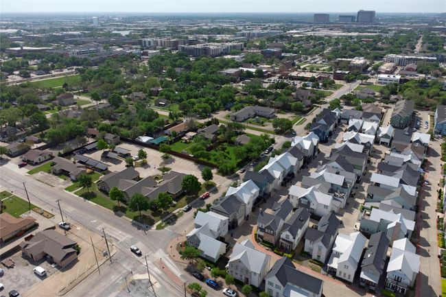 Aerial view, Rice Field and downtown Plano with Haggard Park, DART Rail Station, Shops, Restaurants, and opportunities to soak plenty of positive energy and enjoy local cultural events. | Image 33