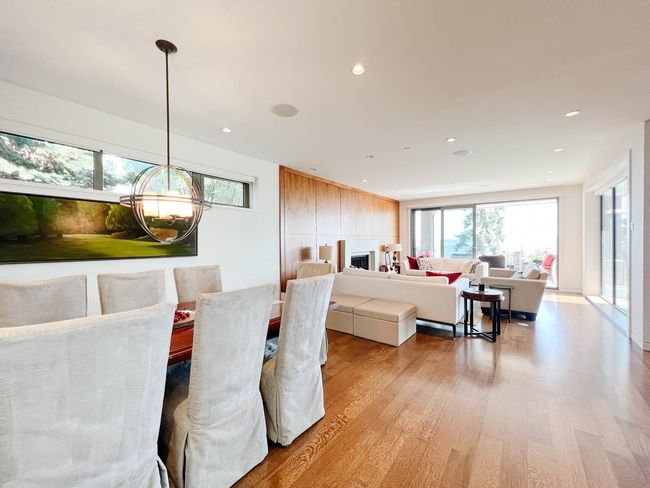 Bedroom with wood finished floors and recessed lighting | Image 4