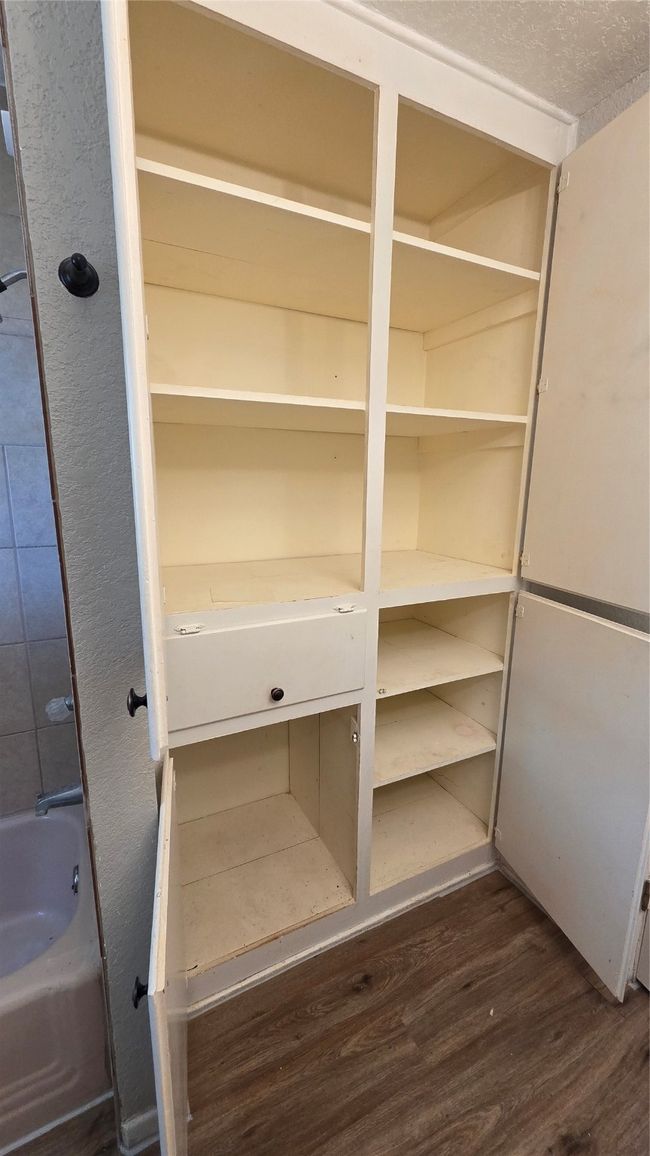 Bathroom storage closet. | Image 17