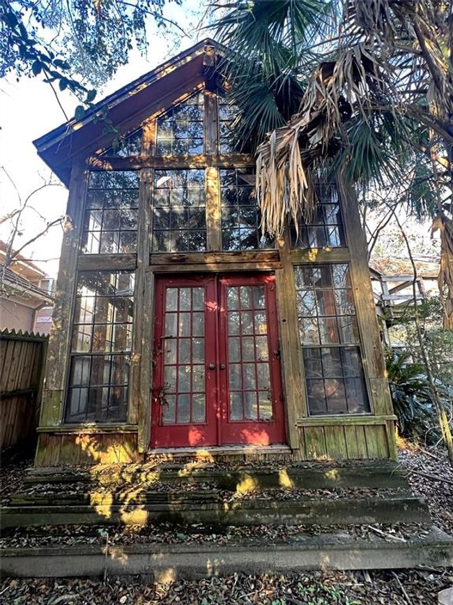 Charming greenhouse-style retreat with rustic charm and abundant natural light. Perfect for garden enthusiasts or a unique studio space. | Image 15