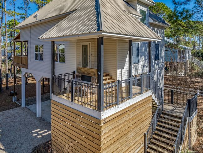 27 Harry Morrison Island Dr, House other with 3 bedrooms, 2 bathrooms and 3 parking in Alligator Point FL | Image 6