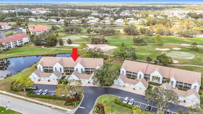 Aerial of western end the The Verandas, unit has both pond and golf course frontage | Image 7