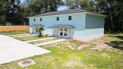 602 W 8th St, Townhouse with 12 bedrooms, 8 bathrooms and null parking in Carrabelle FL | Image 2