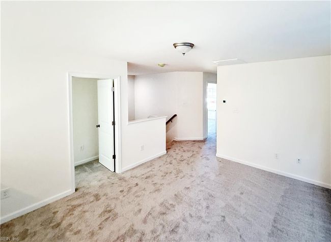 Loft overlooking the family room and a full hall bath complete the second floor. | Image 15