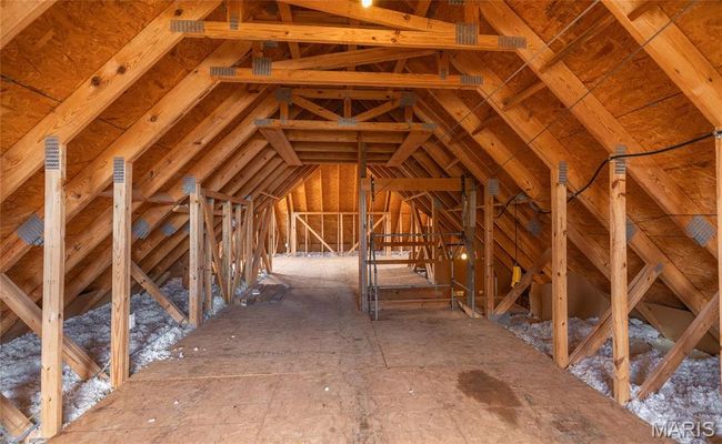 View of unfinished attic in detached garage. | Image 57