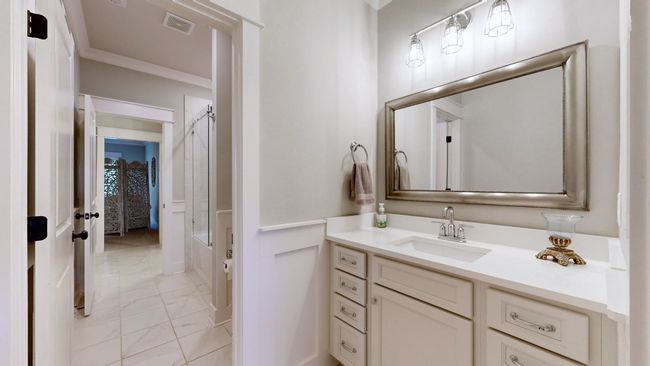 Jack & Jill bathroom featuring Vanity 1—complete with ample storage and stylish finishes, offering both function and privacy for shared living. | Image 47