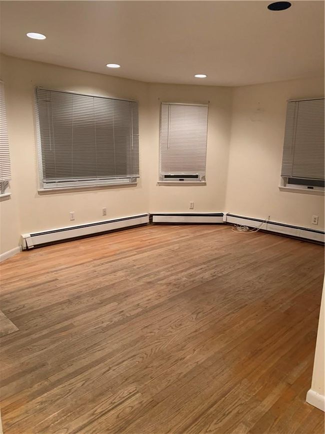 1st Fl Empty room featuring light wood-type flooring | Image 15