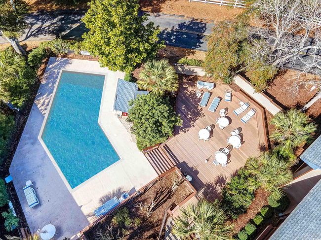 Aerial view of property and surrounding area with a pool area | Image 29