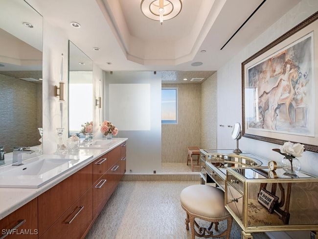 Custom Master bathroom featuring double vanity, walk in shower, and a tray ceiling | Image 18