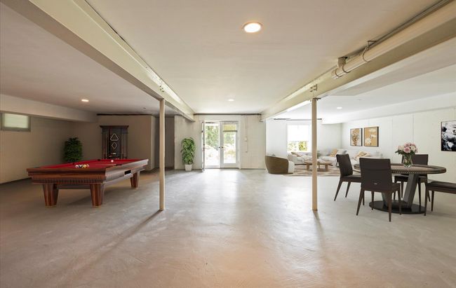 Recreation room with finished concrete flooring, recessed lighting, and billiards | Image 33