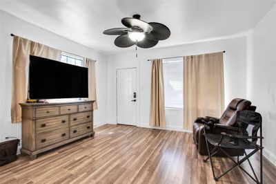 Sitting room featuring ceiling fan and light hardwood / wood-style floors | Image 3