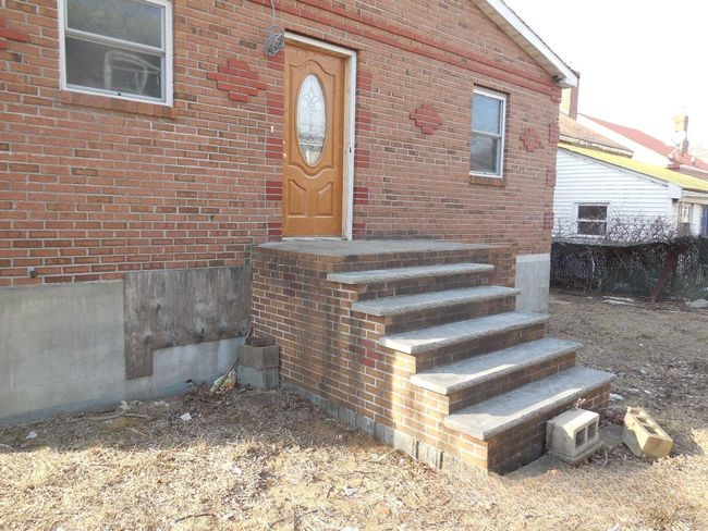 Entrance to property with brick siding | Image 5