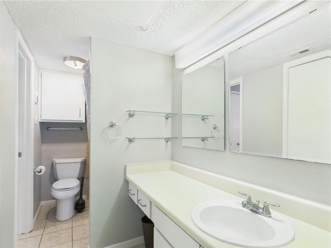 Bathroom with Oversized Vanity & Tub/Shower Combo | Image 12