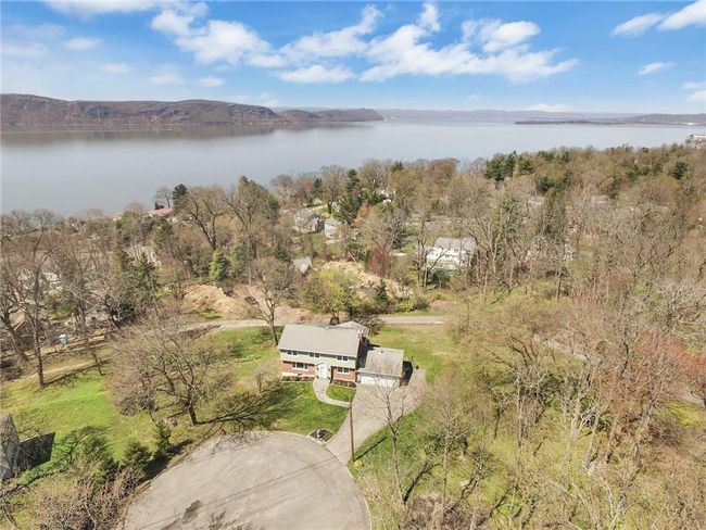 Drone view of property and neighborhood with the Hudson River as a backdrop | Image 27