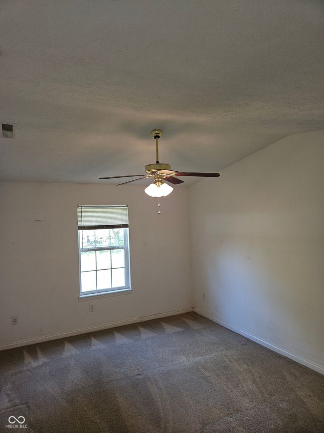 Primary suite with cathedral ceilings | Image 12