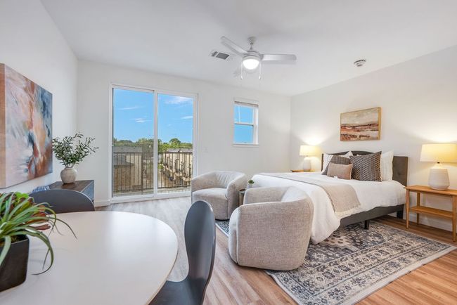 Bedroom with access to outside, light wood-style flooring, and ceiling fan | Image 14