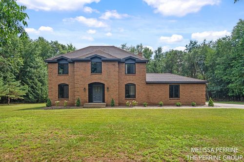 7770 Sudbury Ln, Ada, MI, 49301-9356 | Card Image