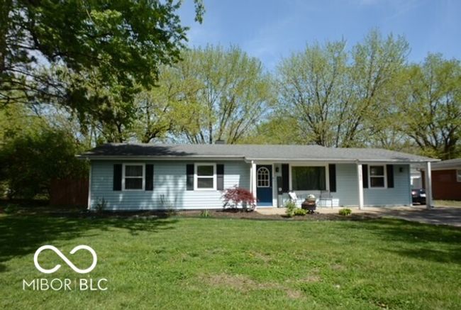 view of front facade with a front lawn | Image 50