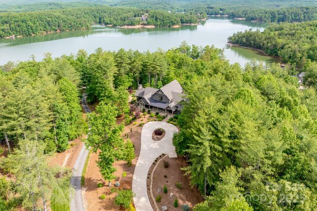 This spectacular home sits in The Old Wildlife Club located in a quiet cove on beautiful Lake James. | Image 42