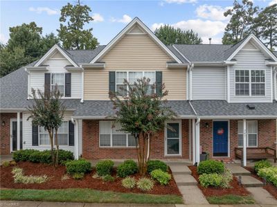 Step into this exquisite townhome nestled in the highly coveted Bridford Downs neighborhood! | Image 1