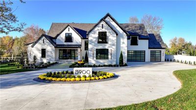 View of front of property featuring a garage | Image 1