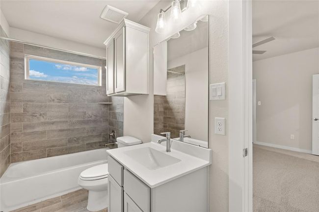 This photo is for illustrative purposes only and is not to be considered an exact replica of the finished home. Rendering does not match the finished product in terms of features, colors, landscaping, etc. Pricing, specifications, square footage and materials are subject to change at any time and without notice. | Image 12