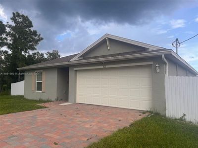 611 Woodcrest Dr, House other with 4 bedrooms, 2 bathrooms and null parking in Lehigh Acres FL | Image 1