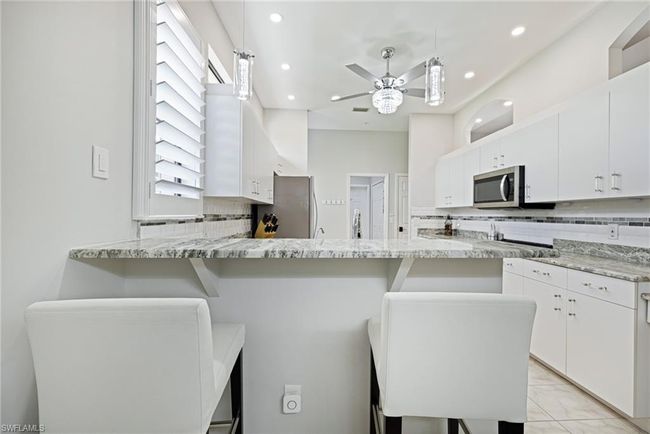 12802 Maiden Cane Ln, Condo with 3 bedrooms, 2 bathrooms and 2 parking in BONITA SPRINGS FL | Image 13