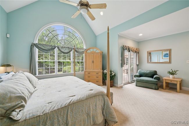 Main level primary bedroom w patio | Image 11