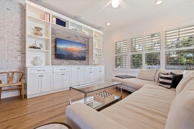 Custom millwork of the build in media center in family room. | Image 3