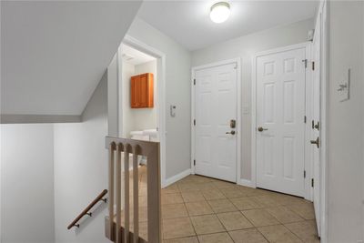 Entry, Powder Room, Door to Garage, Guest Closet, Front Door | Image 2