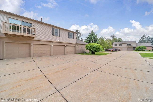 Driveway parking outside of your garage | Image 5