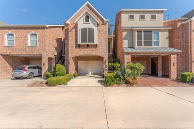 View of front of home with a garage | Image 1