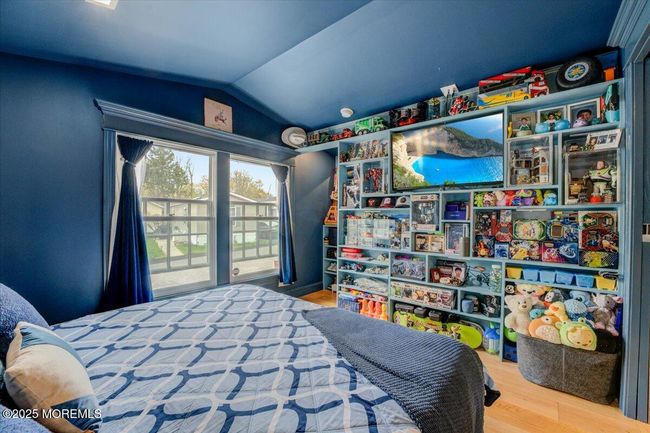 Bedroom with custom cabinetry | Image 11