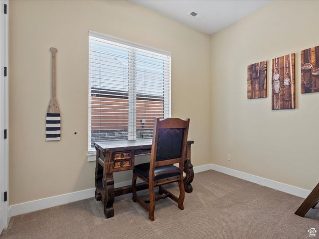 Office area with light carpet and baseboards | Image 26