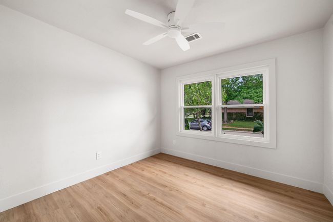 Bedroom 2: Guest bedroom centered in the hallway | Image 14