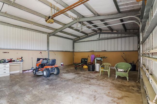 The 3 car garage/shop has 3 bay access. | Image 6