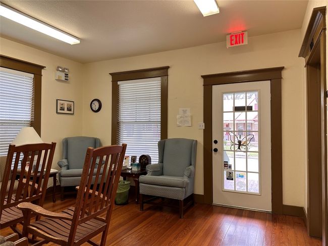 Dining room with wood finished floors | Image 8