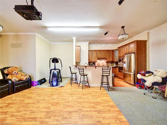 Downstairs bonus w/projector & 4 theater seats & full kitchen | Image 34