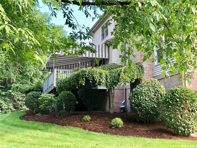 Left side of structure beautifully landscaped for quiet enjoyment | Image 6