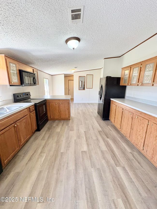 7598 Madison Dr, House other with 4 bedrooms, 2 bathrooms and null parking in Glen St. Mary FL | Image 11