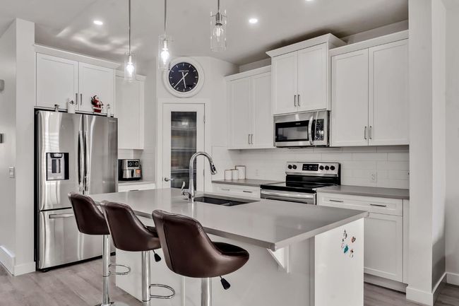 649 Reynolds Cres Sw, House other with 3 bedrooms, 3 bathrooms and 2 parking in Airdrie AB | Image 10
